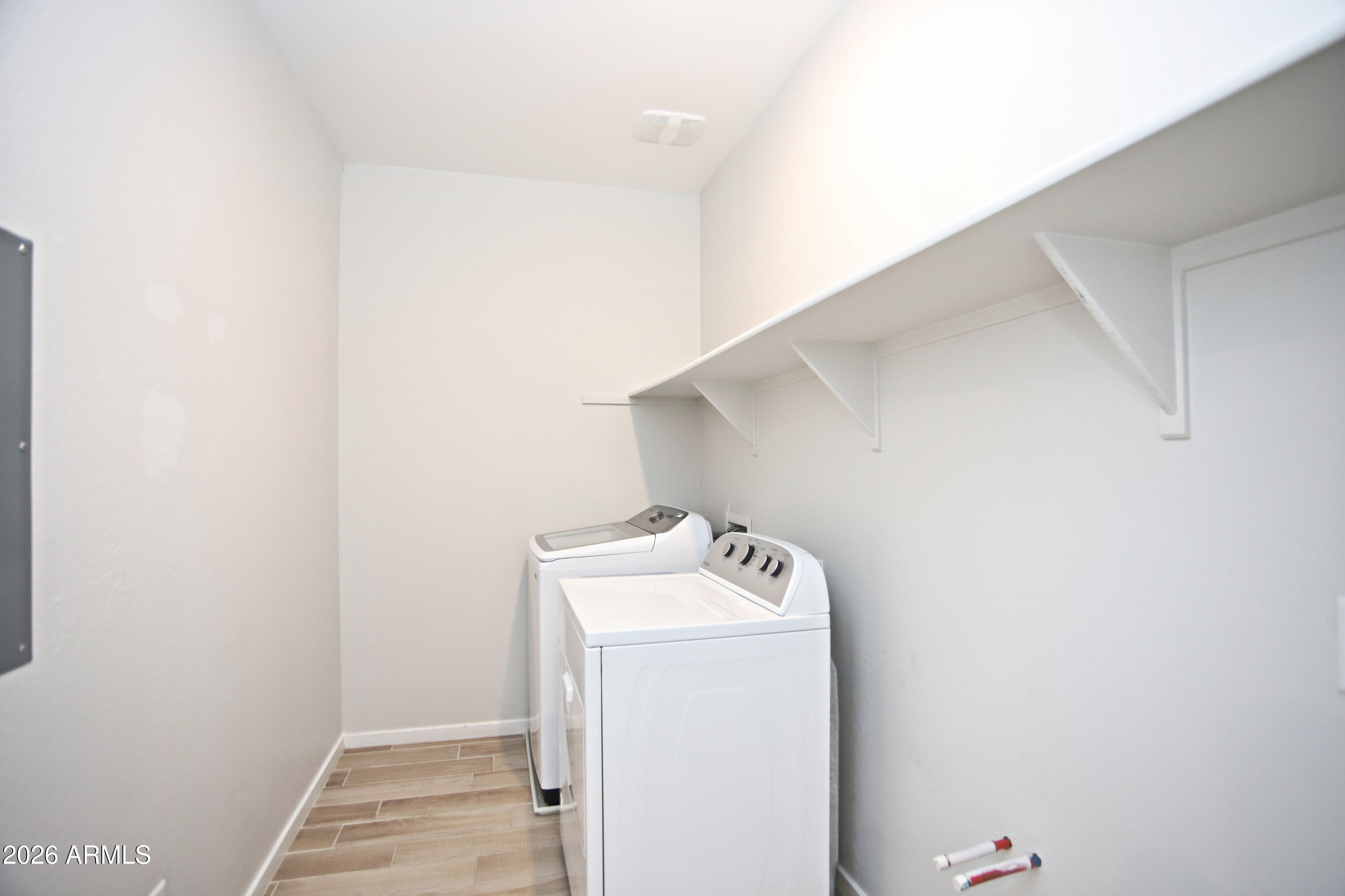 3855 South McQueen Road, Unit 110 Chandler, AZ 85286 - Photo 27 of 37 a utility room with dryer and washer