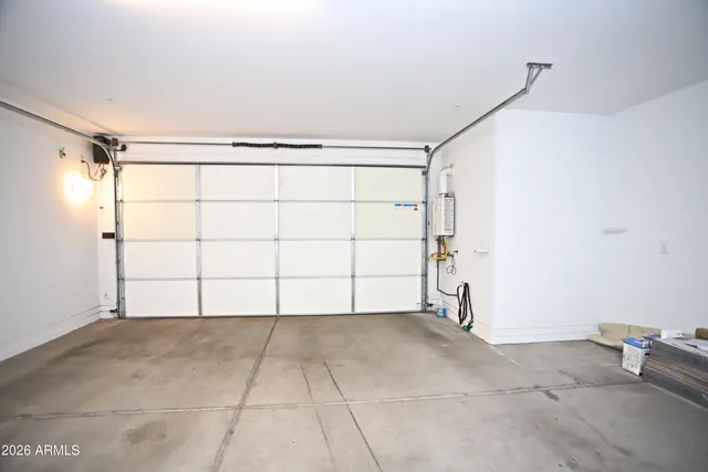 a front view of a house with garage