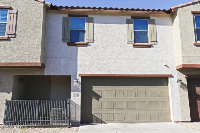 a view of a house with basketball court