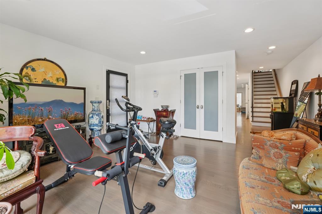 746 Undercliff Avenue, Unit A Edgewater, NJ 07020 - Photo 12 of 44 a view of a livingroom with furniture and a flat screen tv