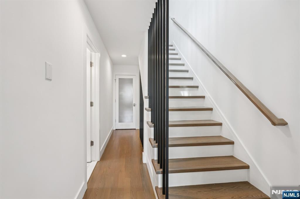 746 Undercliff Avenue, Unit A Edgewater, NJ 07020 - Photo 15 of 44 a view of a hallway with wooden floor and entryway