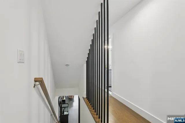 a bedroom with bed and a window