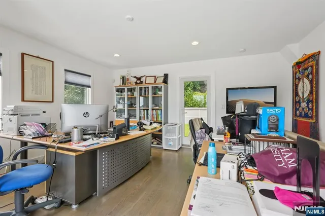 a room that has a bed and a dresser in it