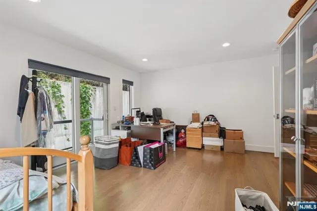 a bathroom with a double vanity sink mirror and toilet