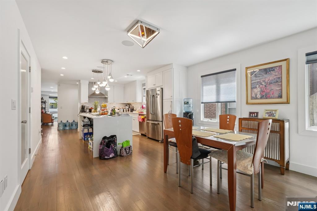 746 Undercliff Avenue, Unit A Edgewater, NJ 07020 - Photo 7 of 44 a view of a dining room with furniture and wooden floor