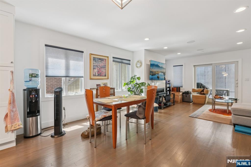 746 Undercliff Avenue, Unit A Edgewater, NJ 07020 - Photo 9 of 44 a view of a dining room with furniture and wooden floor