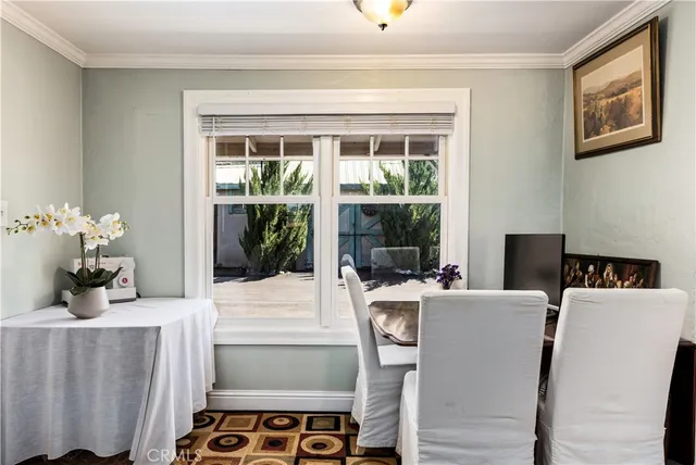 a kitchen with stainless steel appliances a refrigerator and cabinets