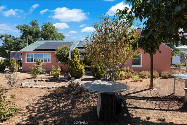 a front view of a house with a porch
