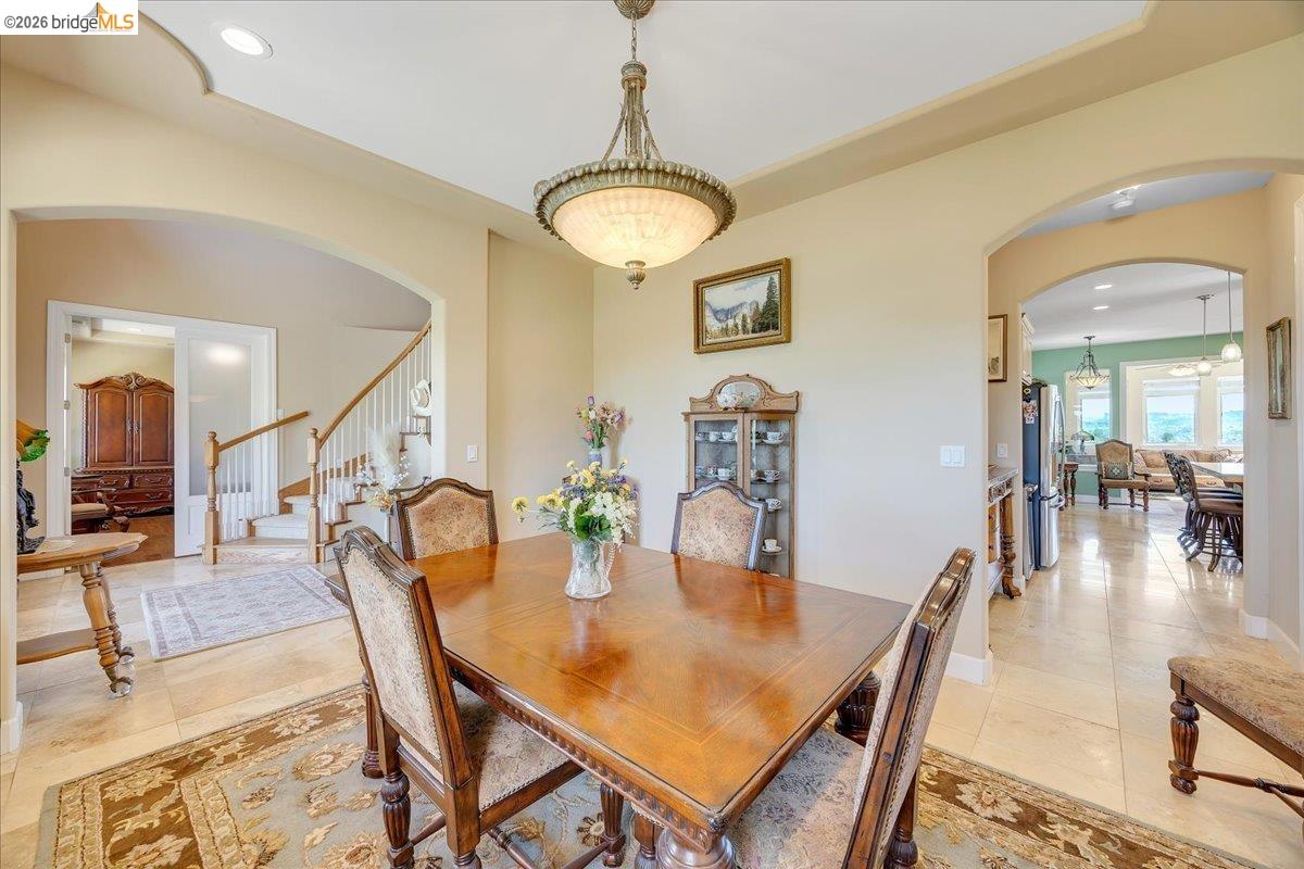 14814 Twist Road Jamestown, CA 95327 - Photo 19 of 60 a dining room with furniture and wooden floor