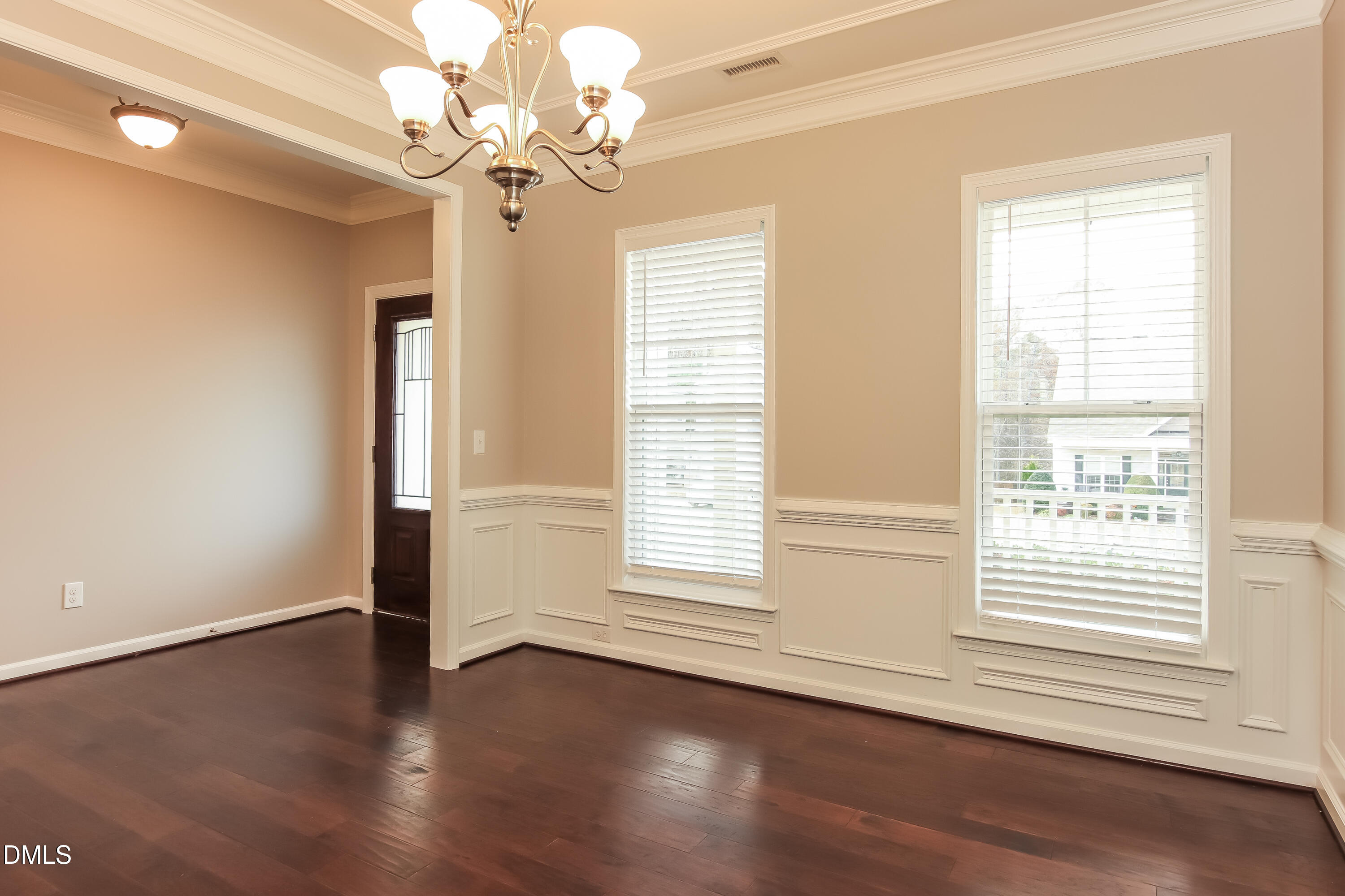 1237 Barnford Mill Road Wake Forest, NC 27587 - Photo 5 of 17 a view of an empty room with wooden floor and a window