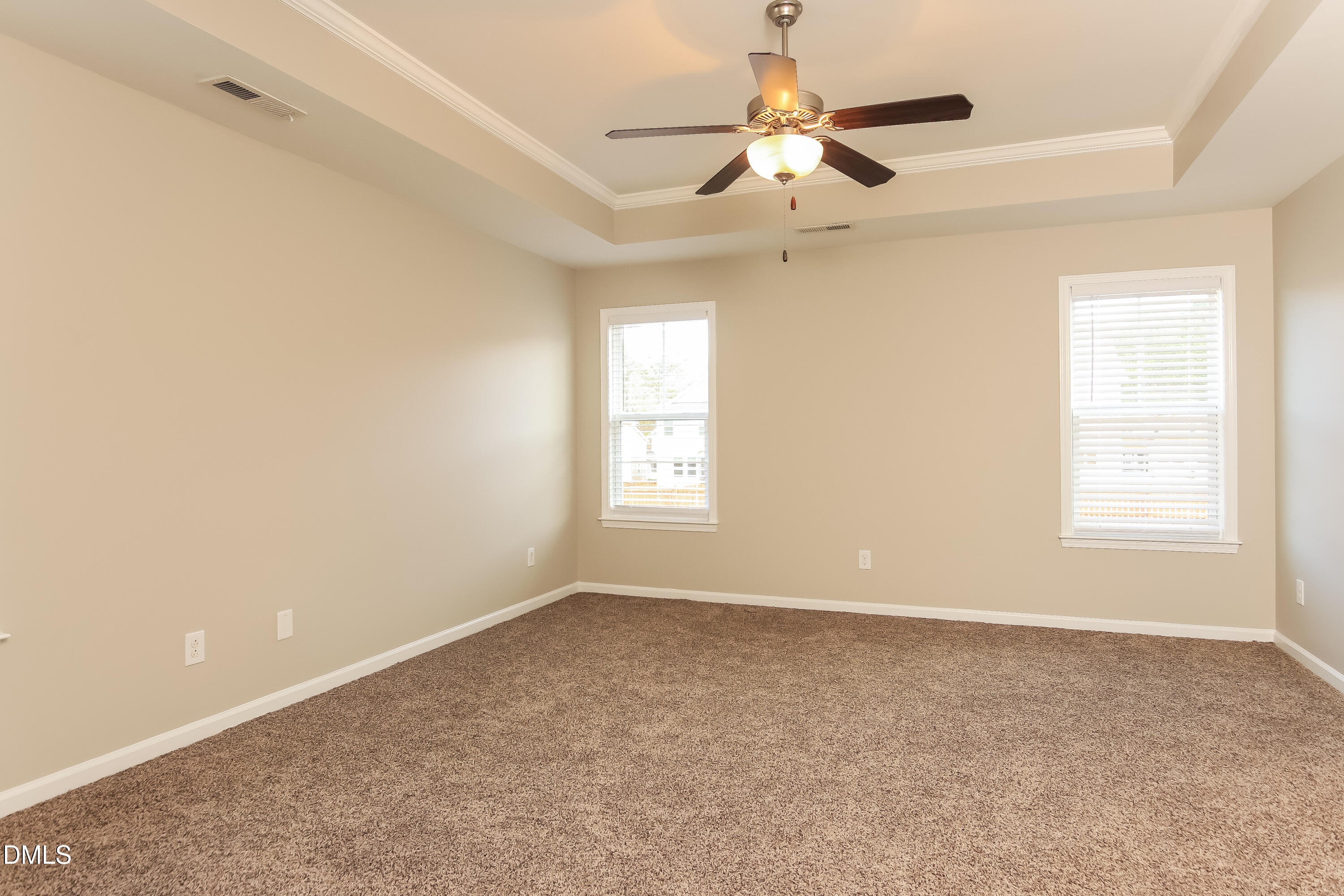 1237 Barnford Mill Road Wake Forest, NC 27587 - Photo 8 of 17 an empty room with a window and a fan