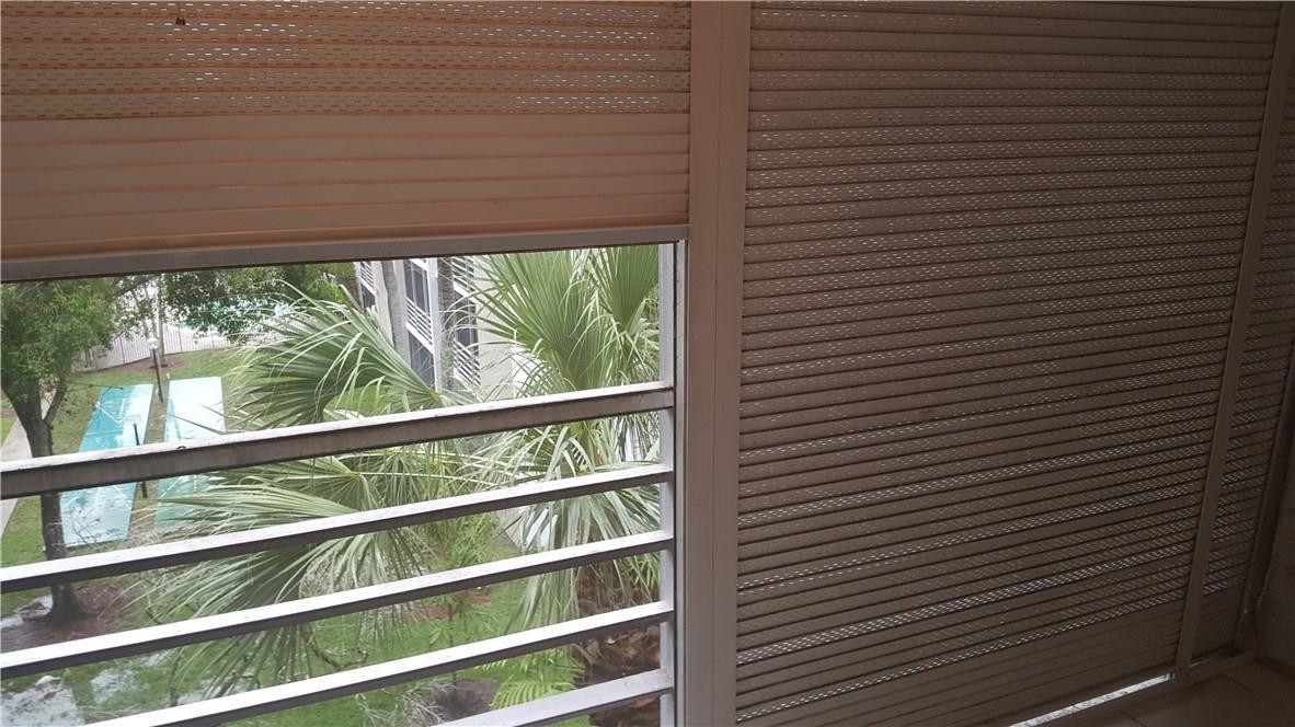 3591 Inverrary Drive, Unit 406 Lauderhill, FL 33319 - Photo 12 of 12 a view of a room with a large window