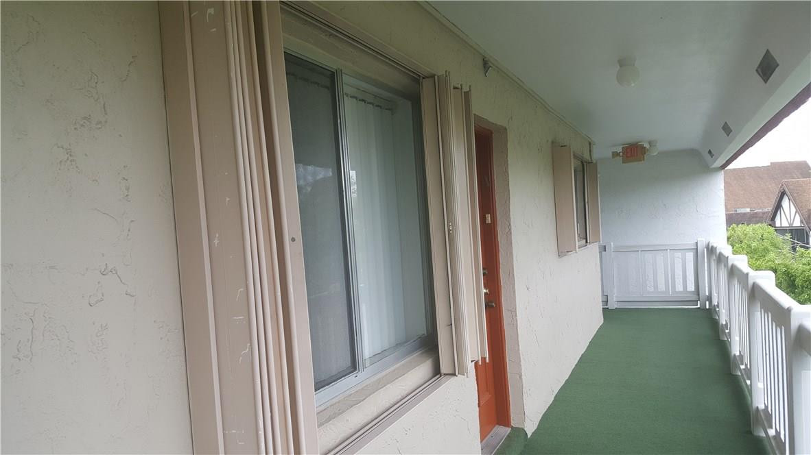3591 Inverrary Drive, Unit 406 Lauderhill, FL 33319 - Photo 2 of 12 a view of a porch of a house
