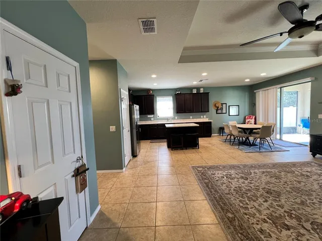 a view of a kitchen and dining room