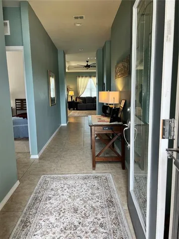 a living room with furniture and a rug