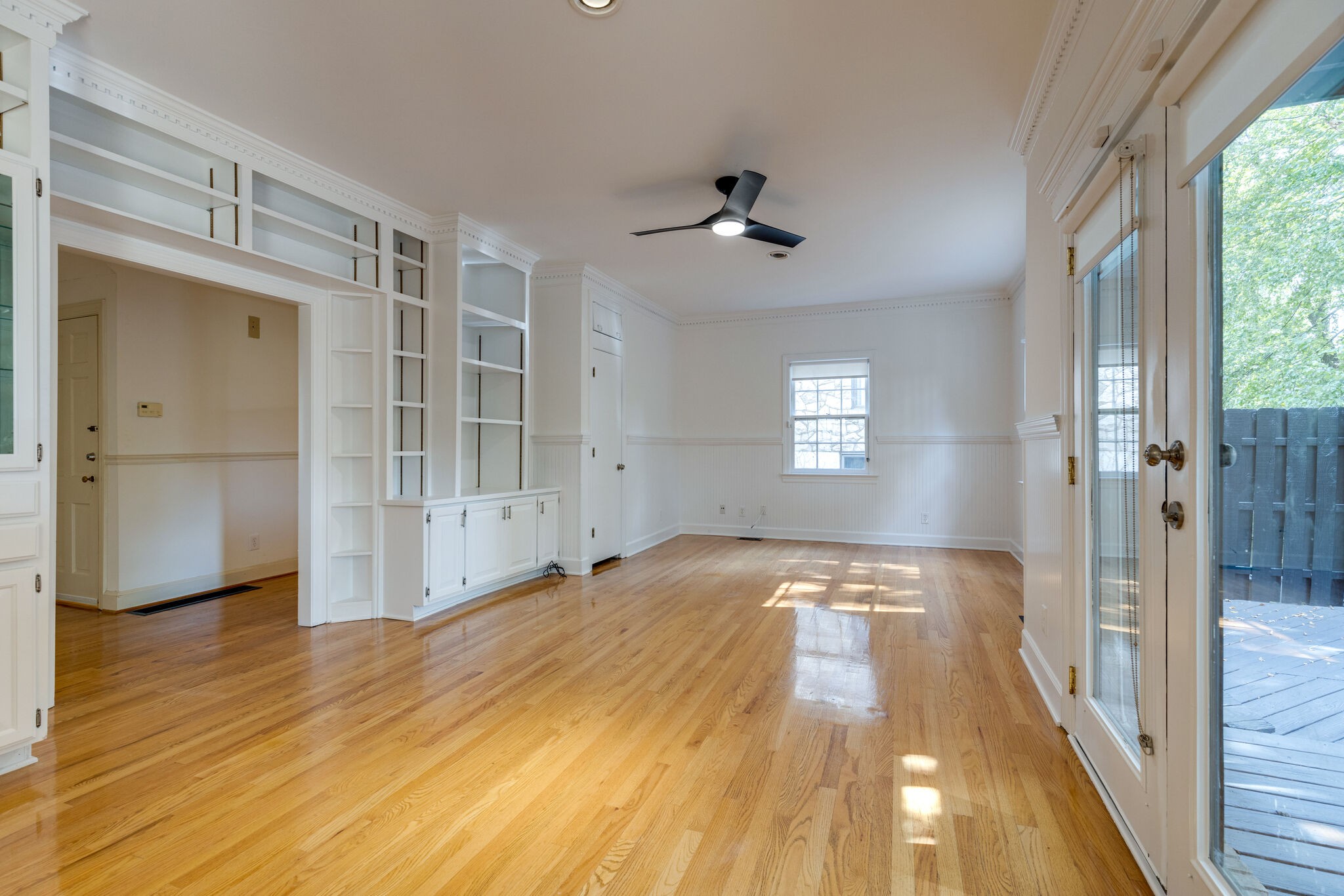 111 Mockingbird Road Nashville, TN 37205 - Photo 17 of 49 a view of an empty room with wooden floor and a window
