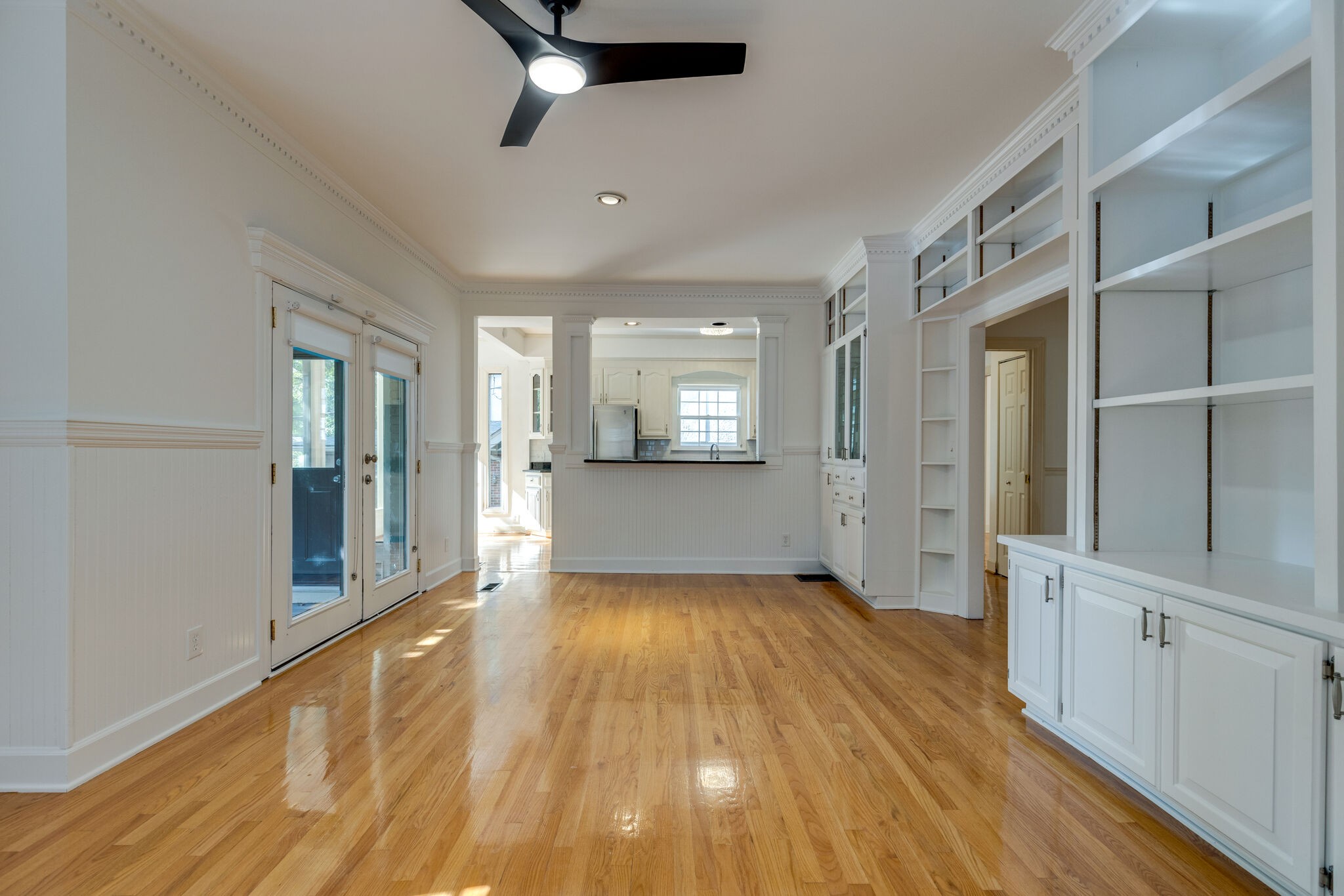 111 Mockingbird Road Nashville, TN 37205 - Photo 18 of 49 wooden floor in an empty room with a window