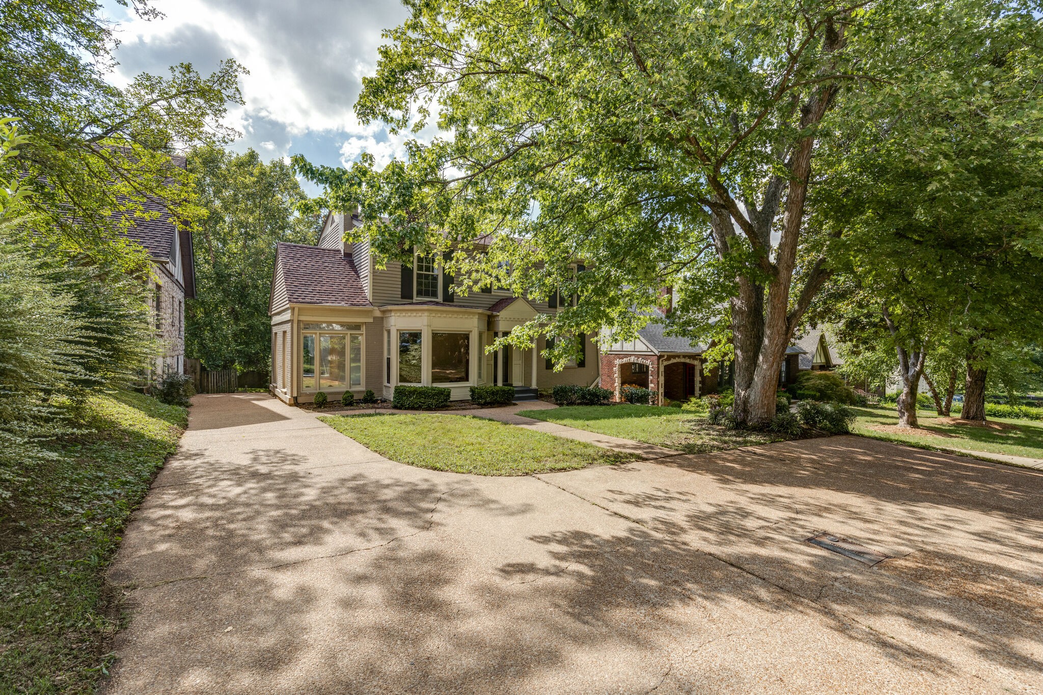 111 Mockingbird Road Nashville, TN 37205 - Photo 3 of 49 a view of a house with a yard