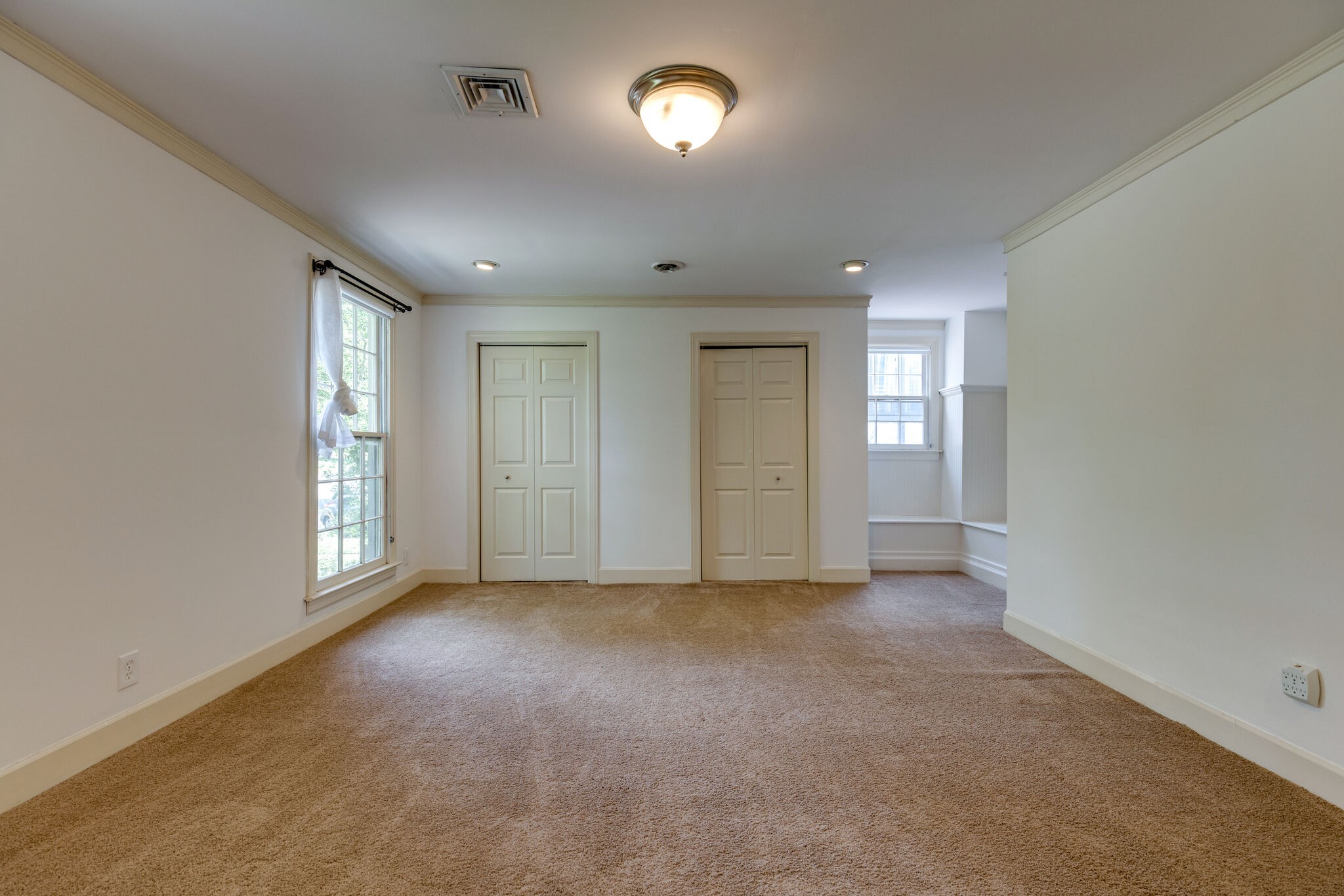 111 Mockingbird Road Nashville, TN 37205 - Photo 22 of 49 a view of an empty room with a window