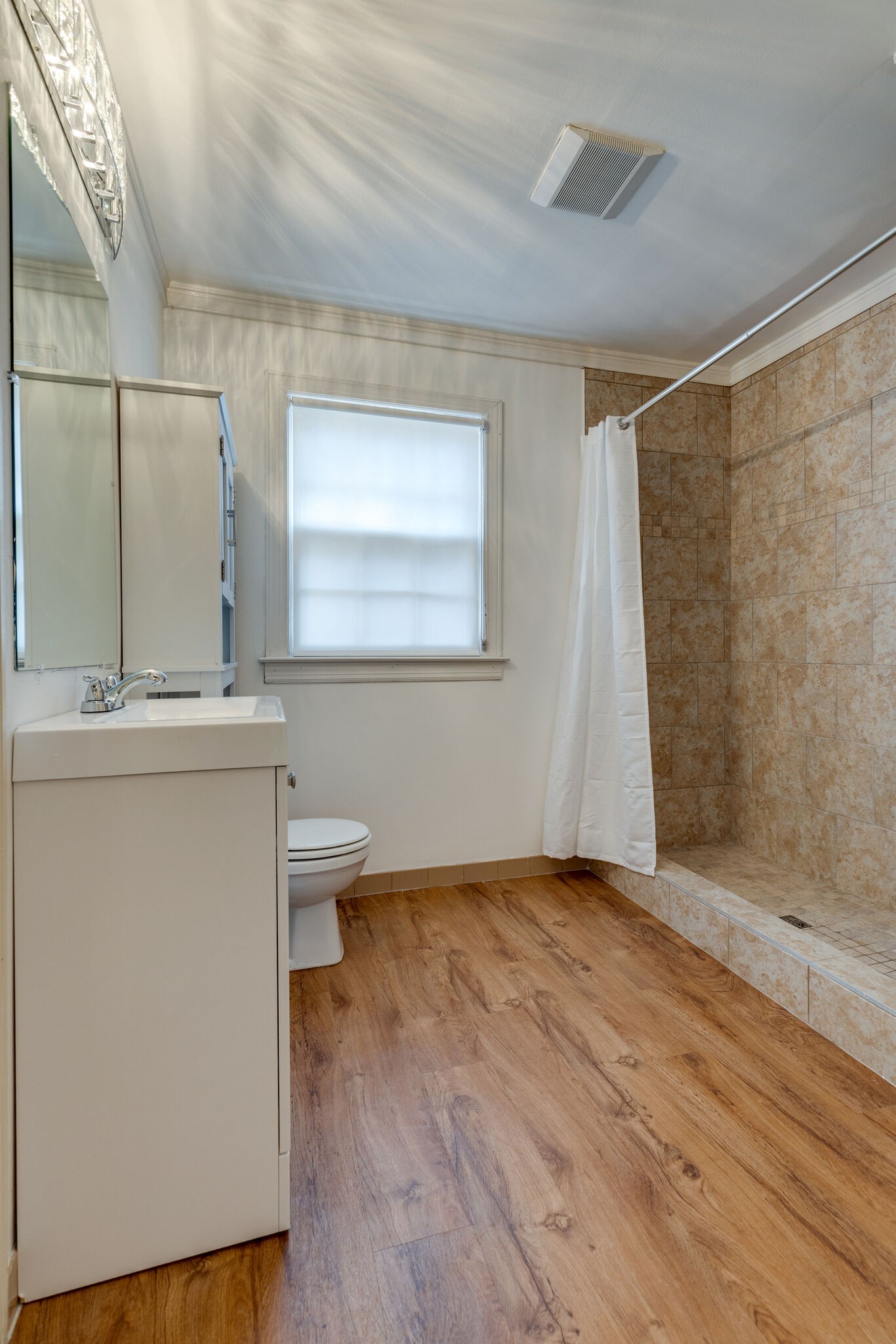 111 Mockingbird Road Nashville, TN 37205 - Photo 23 of 49 a bathroom with a sink a toilet a mirror and shower