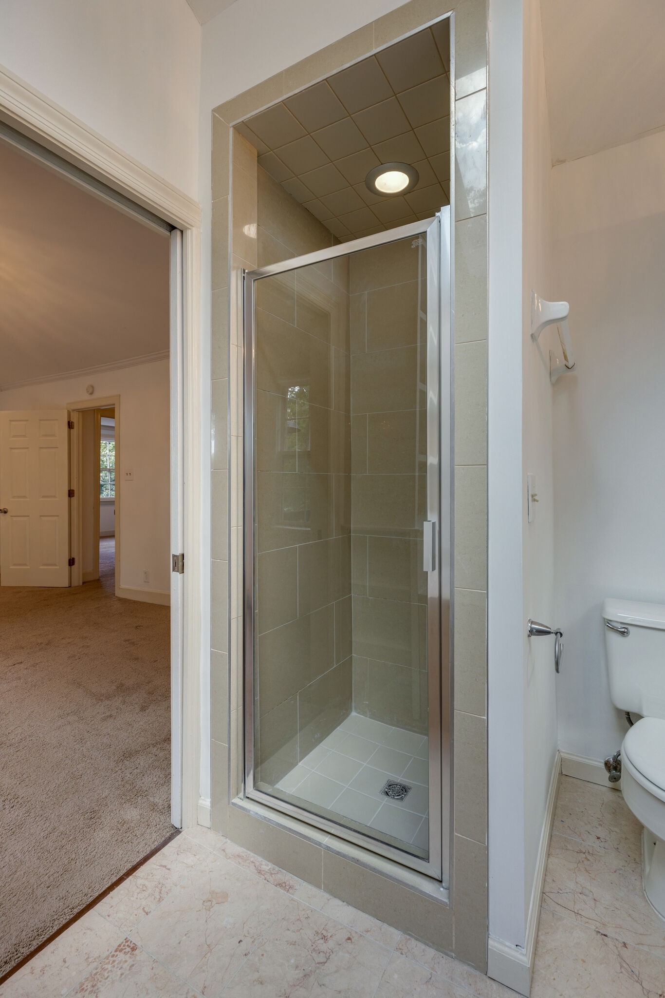 111 Mockingbird Road Nashville, TN 37205 - Photo 34 of 49 a bathroom with a glass shower door