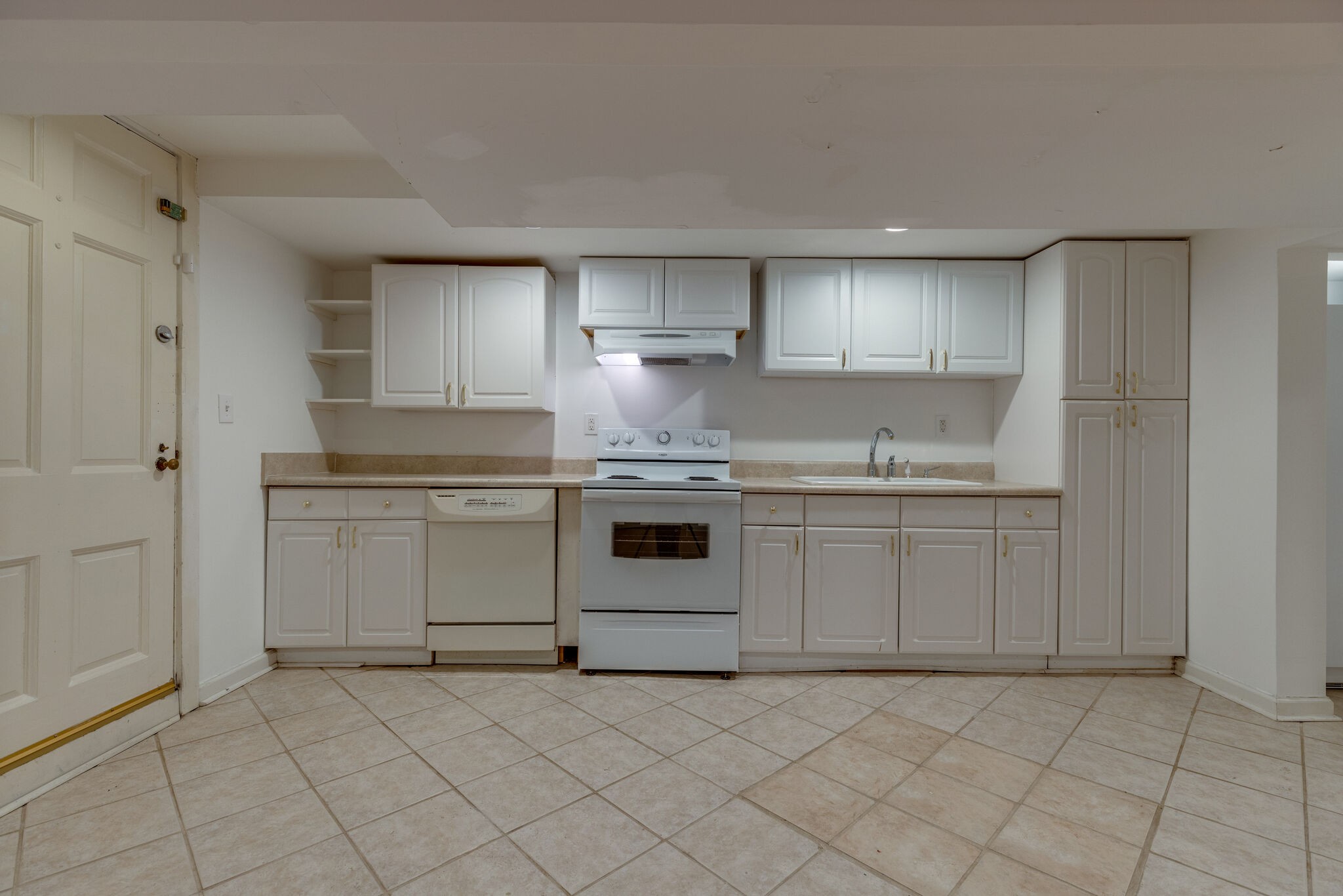 111 Mockingbird Road Nashville, TN 37205 - Photo 37 of 49 a kitchen with granite countertop white cabinets and white stainless steel appliances
