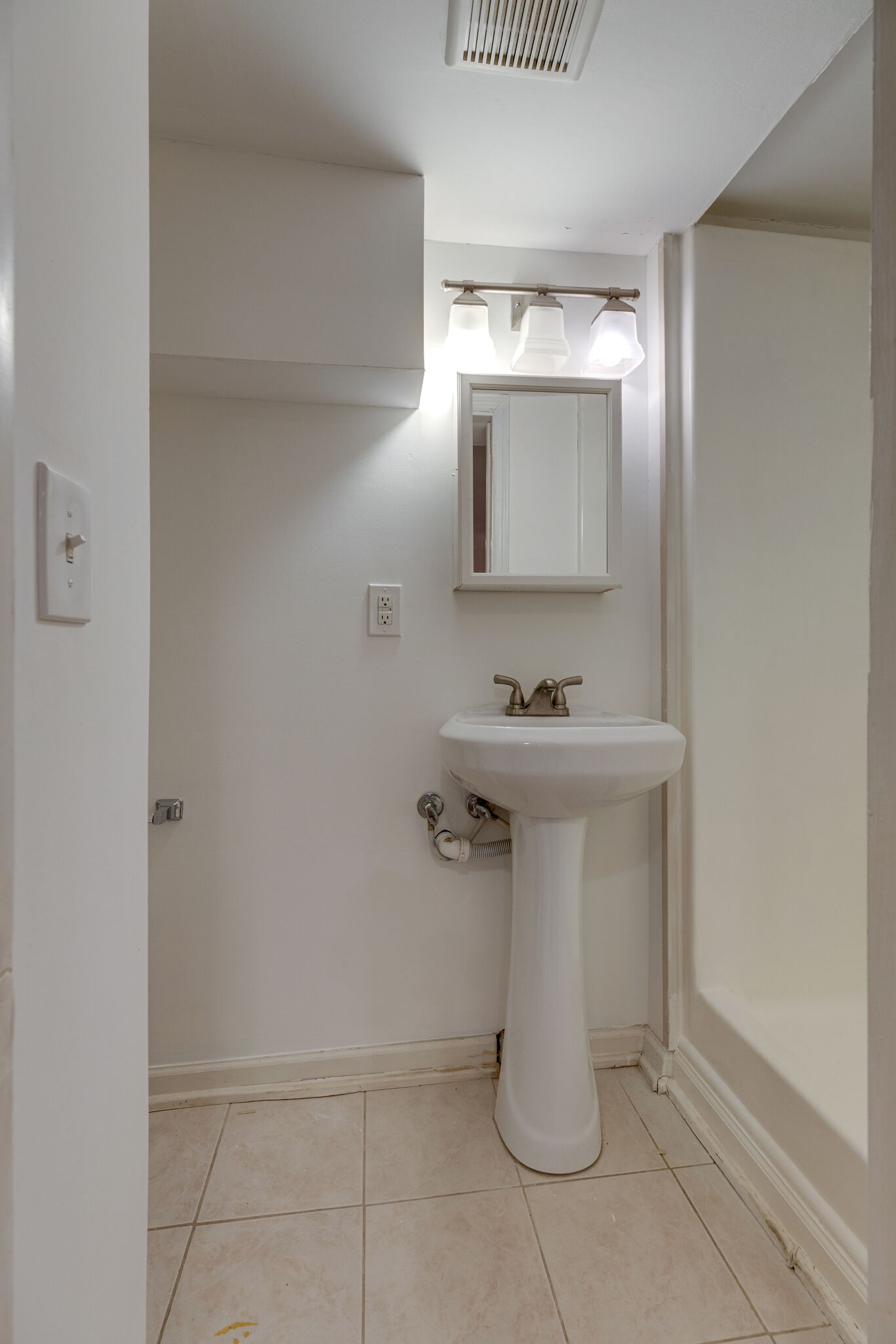 111 Mockingbird Road Nashville, TN 37205 - Photo 41 of 49 a bathroom with a sink and mirror