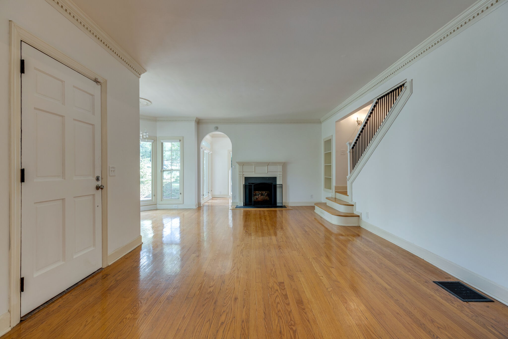 111 Mockingbird Road Nashville, TN 37205 - Photo 6 of 49 wooden floor fireplace and natural light in room
