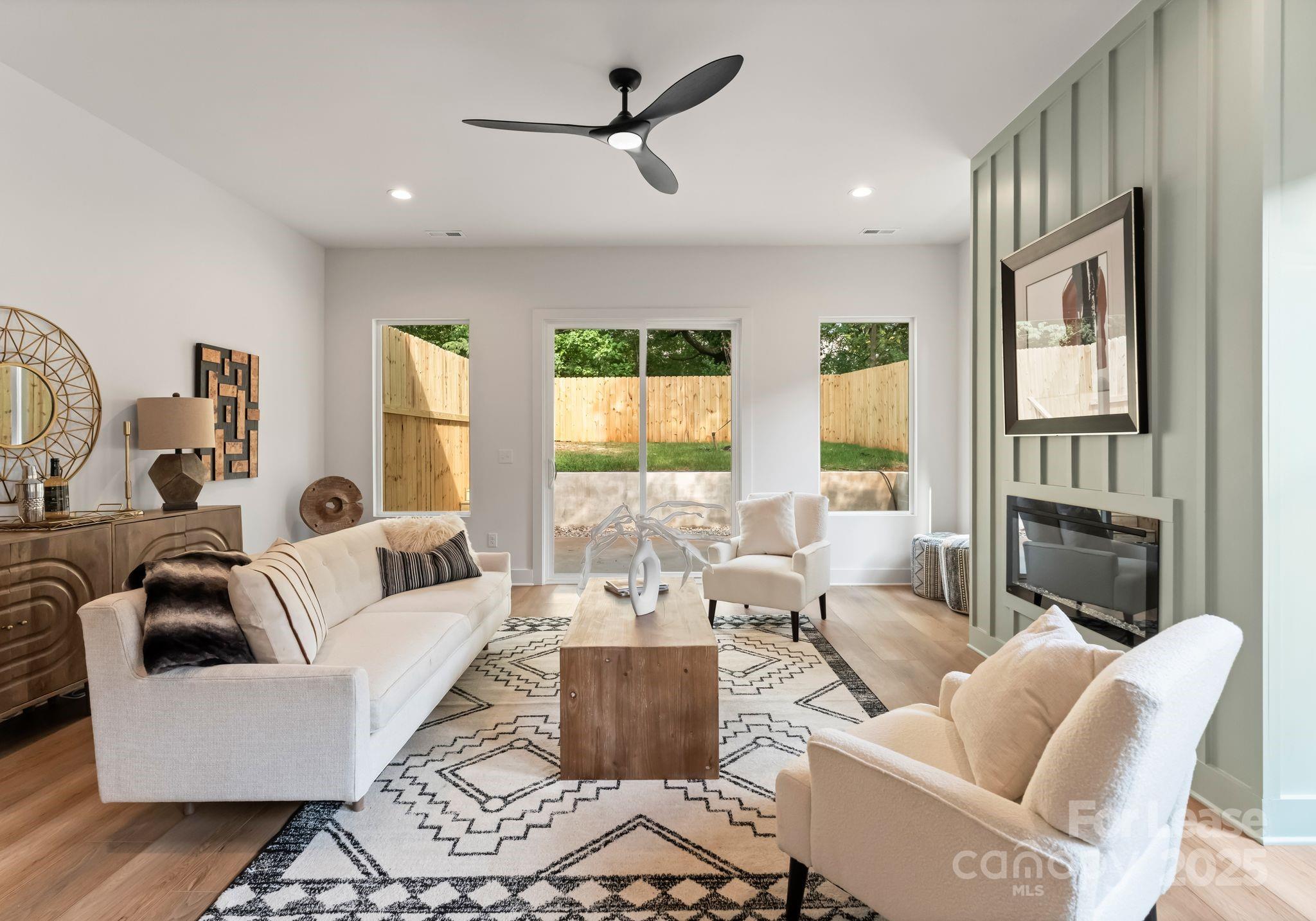 2413 Pruitt Street Charlotte, NC 28208 - Photo 13 of 35 a living room with furniture and a large window