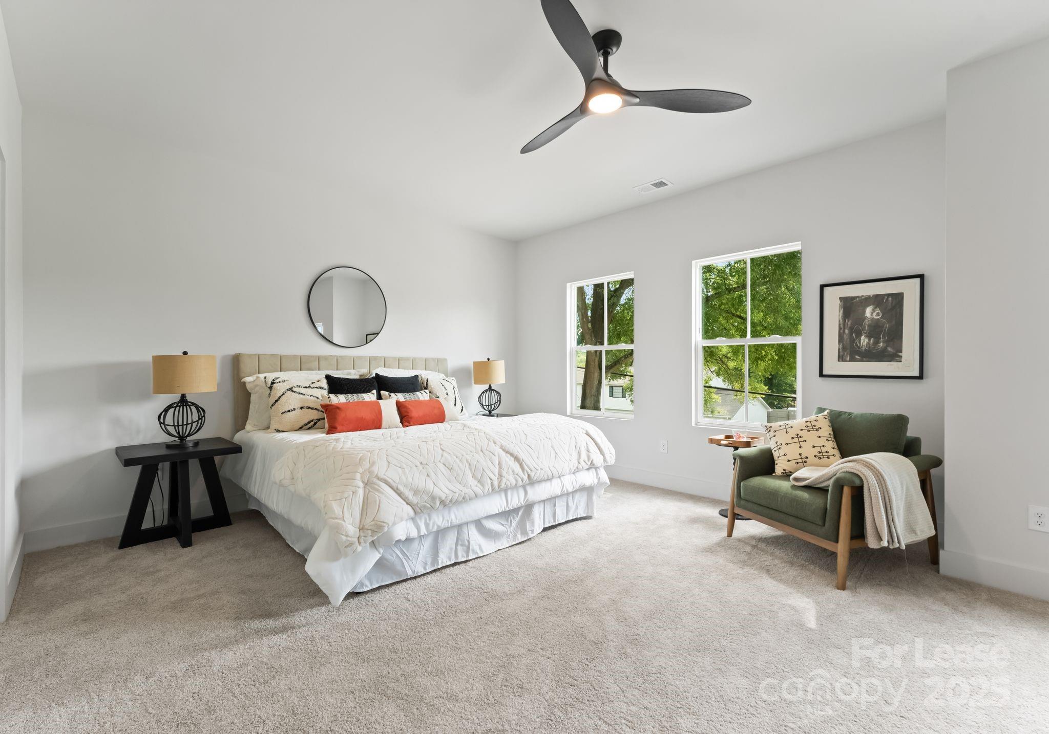 2413 Pruitt Street Charlotte, NC 28208 - Photo 15 of 35 a bed room with furniture and a window