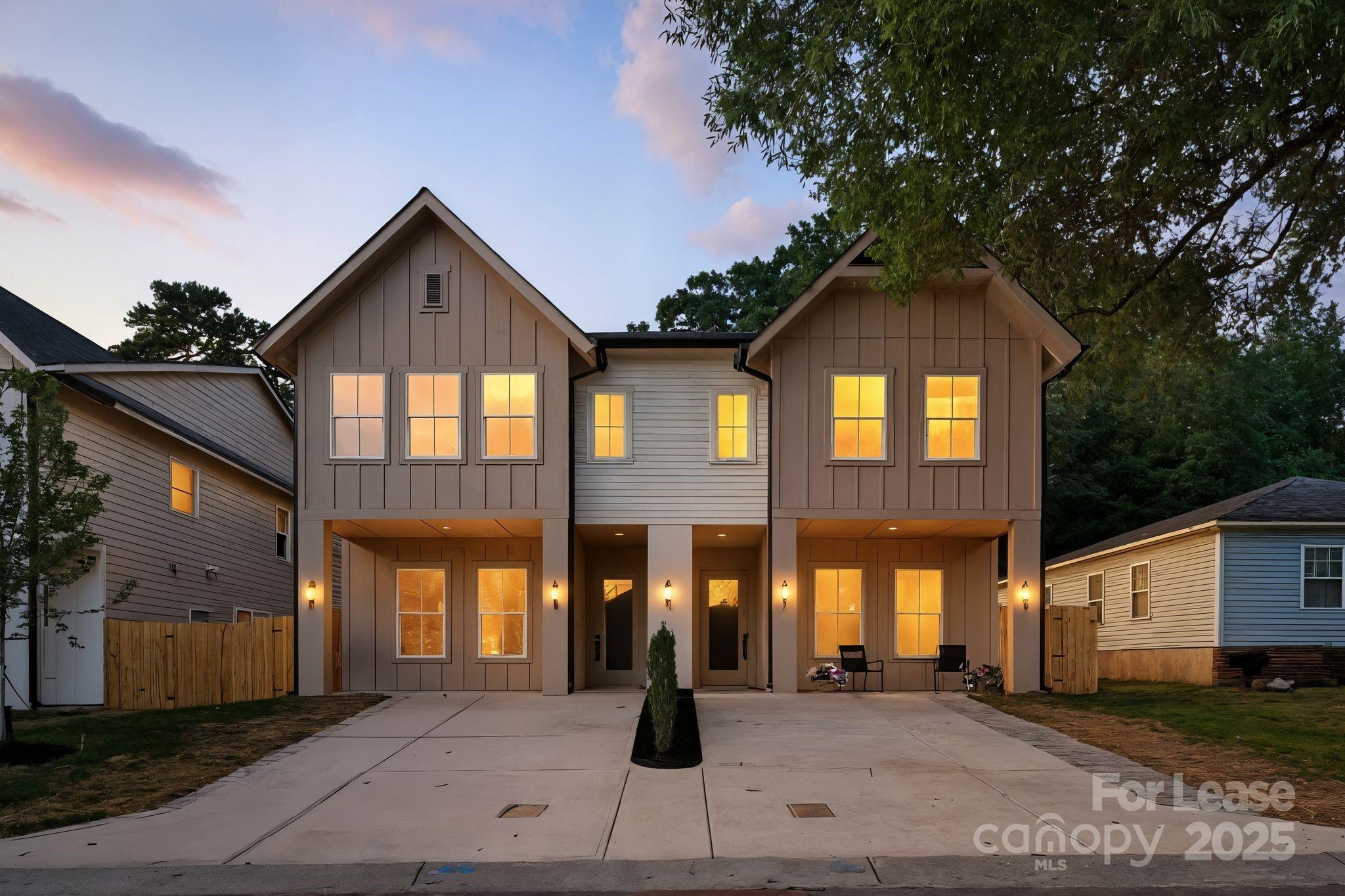2413 Pruitt Street Charlotte, NC 28208 - Photo 2 of 35 a front view of a building with glass windows