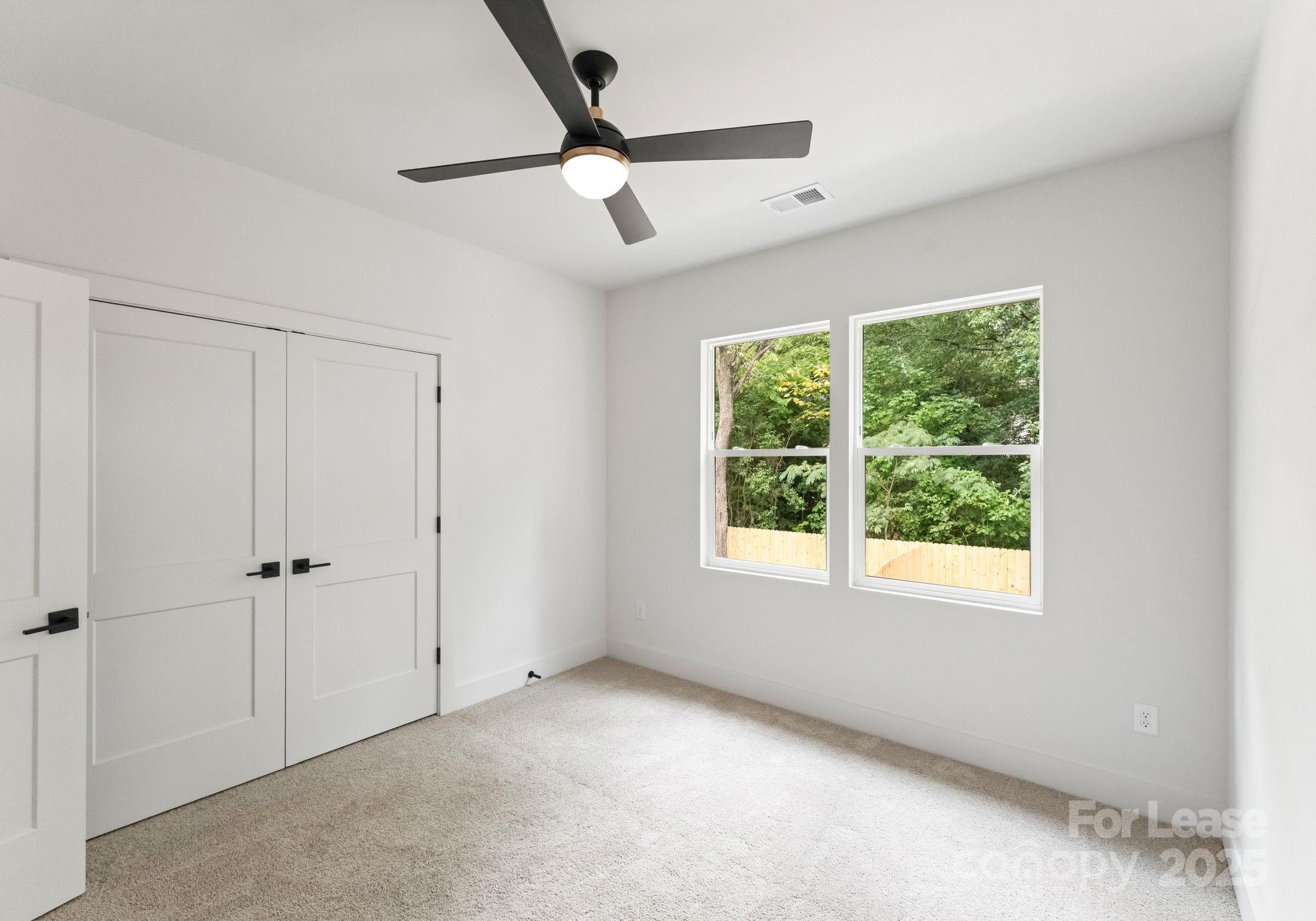 2413 Pruitt Street Charlotte, NC 28208 - Photo 23 of 35 a view of an empty room with a window