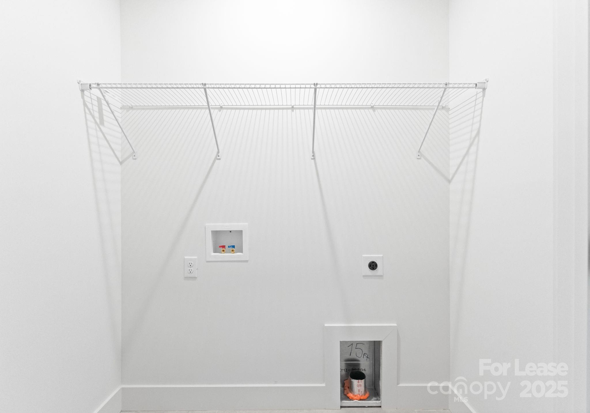 2413 Pruitt Street Charlotte, NC 28208 - Photo 24 of 35 a view of small space with racks on the wall