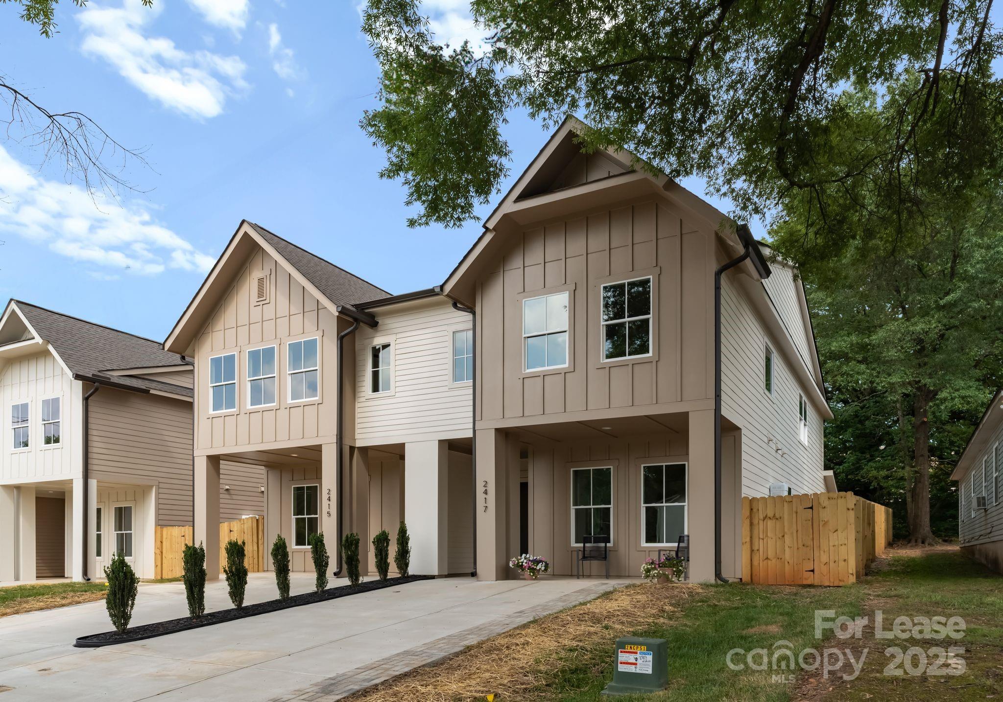 2413 Pruitt Street Charlotte, NC 28208 - Photo 3 of 35 a view of a house with a yard