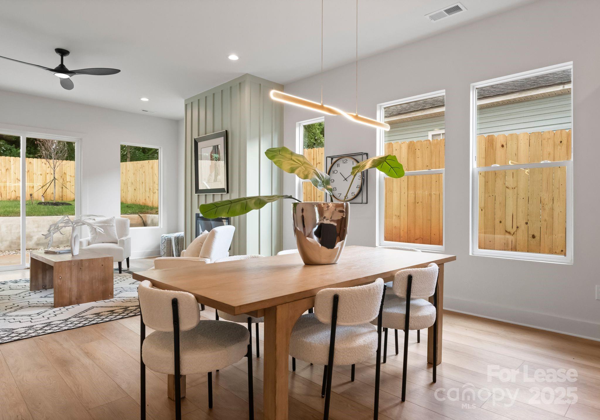 2413 Pruitt Street Charlotte, NC 28208 - Photo 31 of 35 a view of a dining room with furniture and a large window