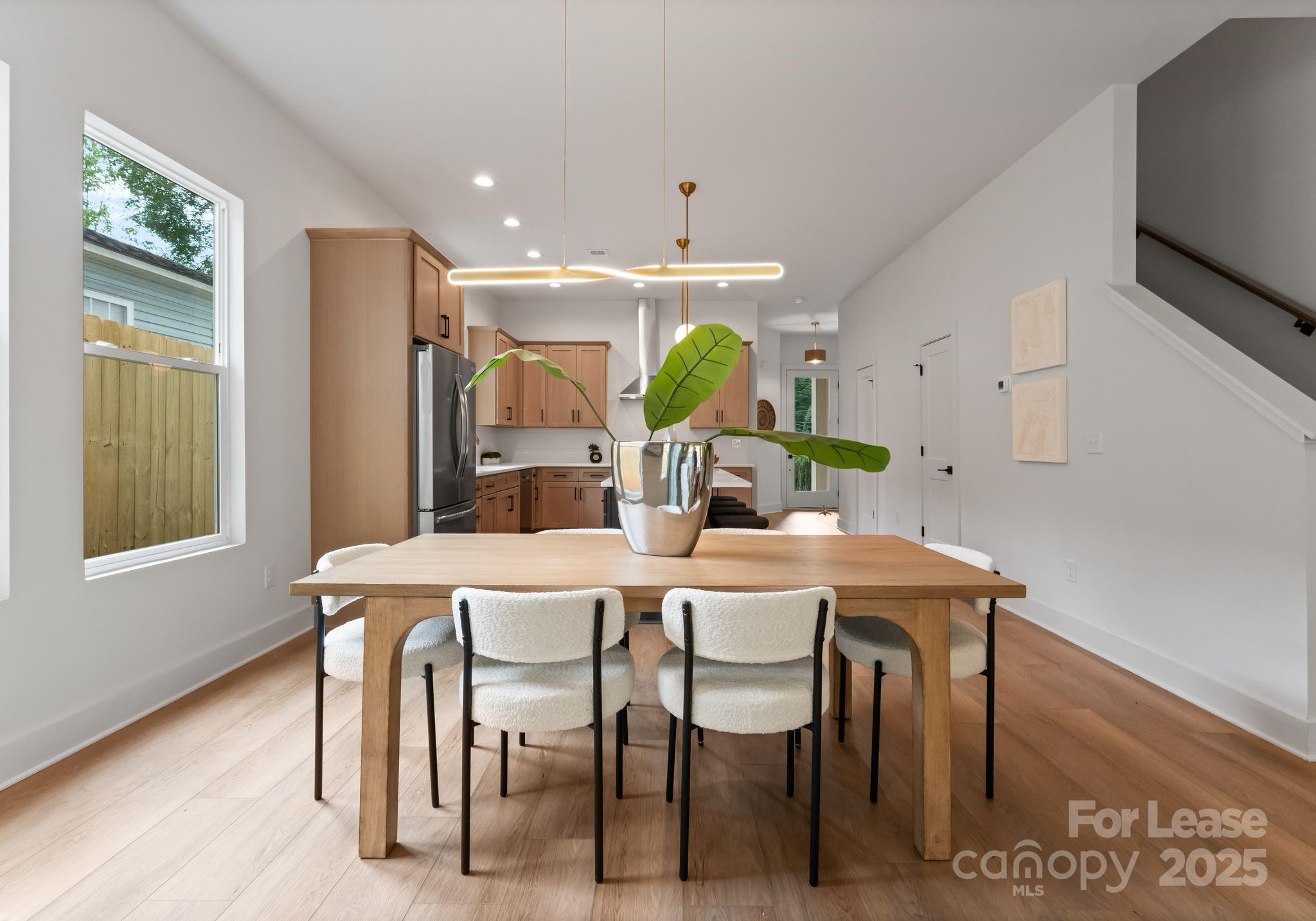 2413 Pruitt Street Charlotte, NC 28208 - Photo 33 of 35 a view of a dining room with furniture and window