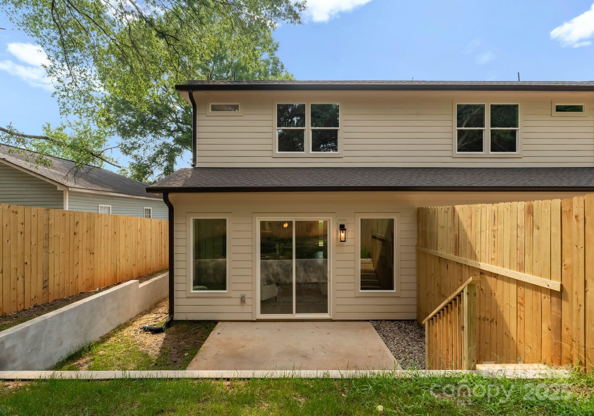 2413 Pruitt Street Charlotte, NC 28208 - Photo 7 of 35 a view of house with backyard