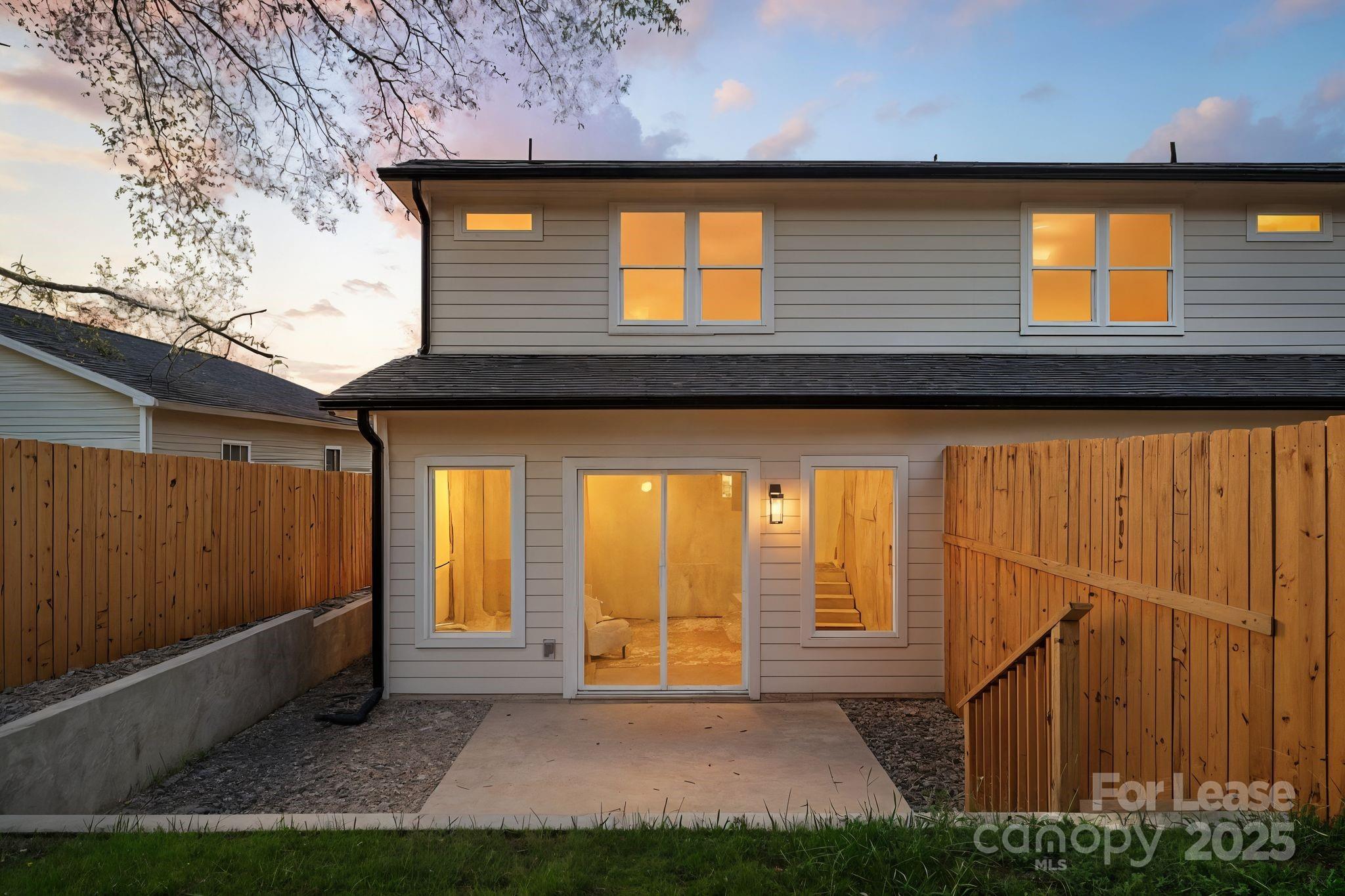 2413 Pruitt Street Charlotte, NC 28208 - Photo 8 of 35 a view of a house with a yard