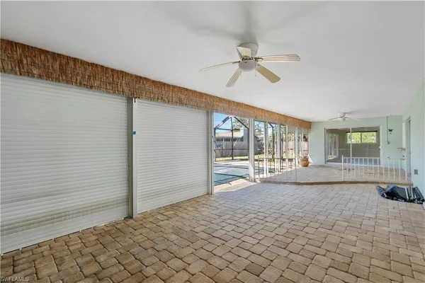 a view of a livingroom with a patio and a yard