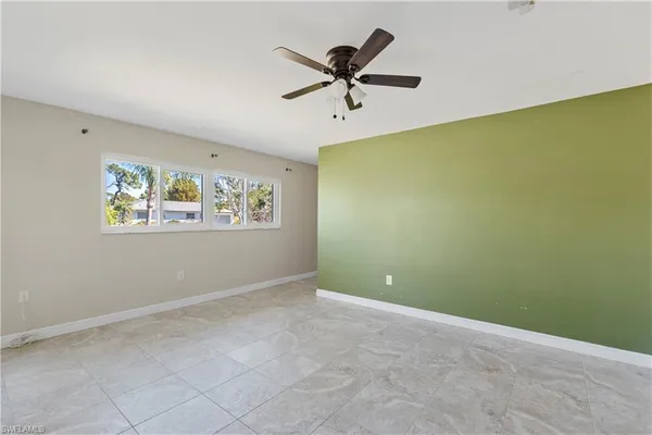 a view of a big room with carpet