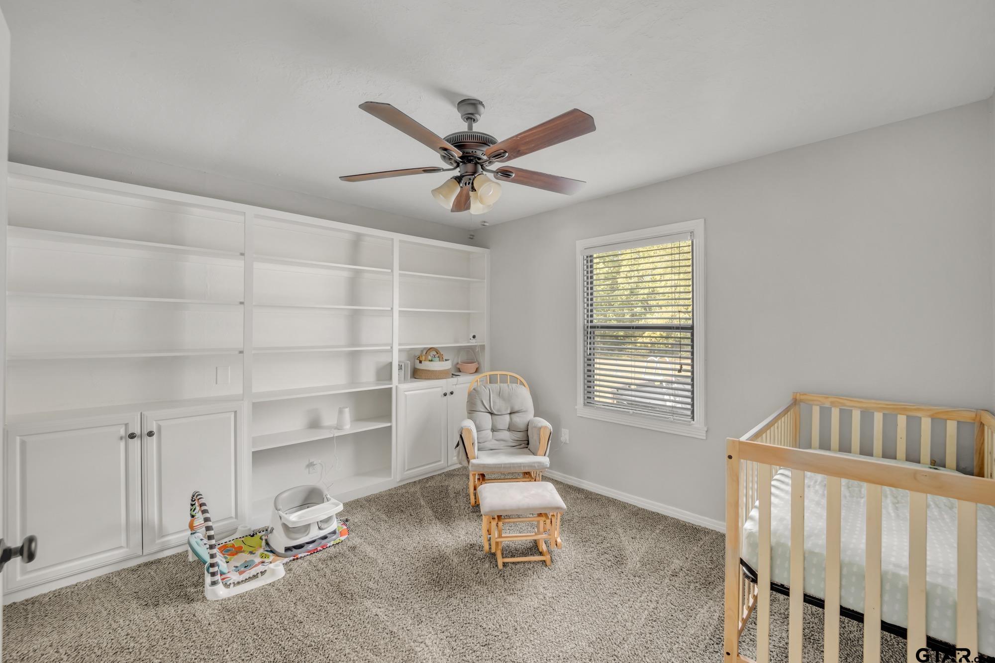 3601 Dumas Road Longview, TX 75604 - Photo 21 of 27 a bedroom with a bed and a window