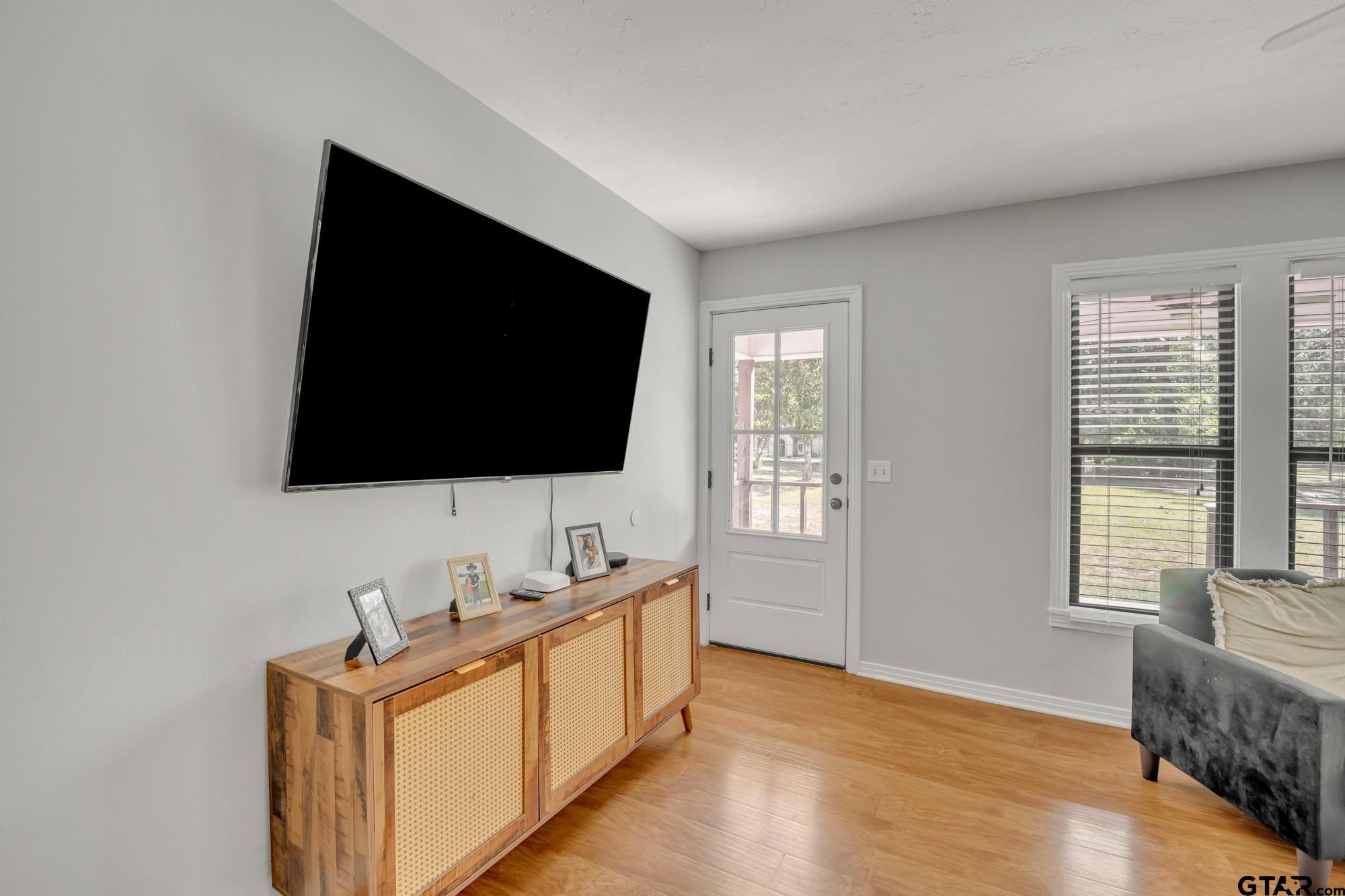 3601 Dumas Road Longview, TX 75604 - Photo 4 of 27 a living room with furniture and a flat screen tv
