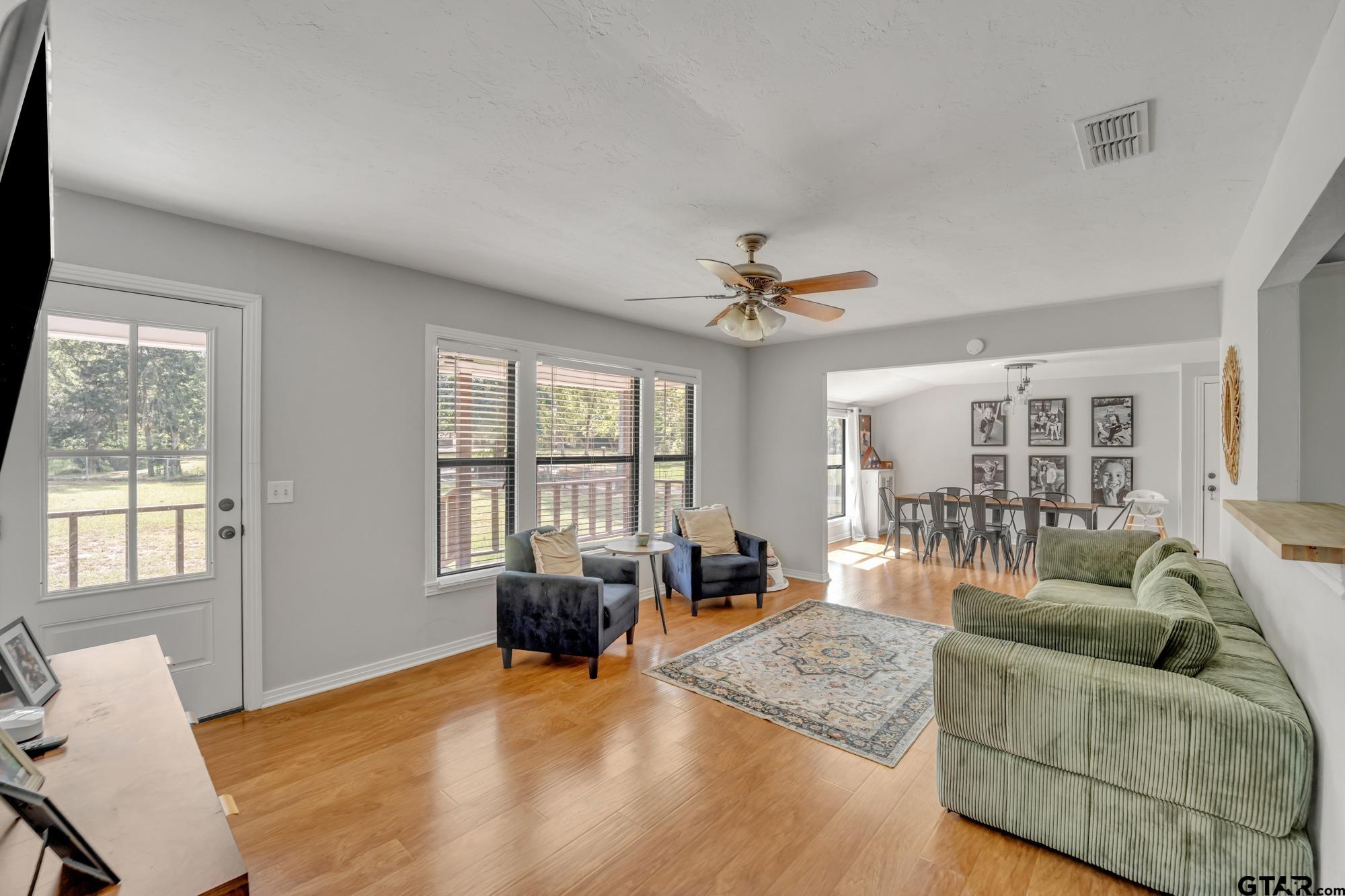 3601 Dumas Road Longview, TX 75604 - Photo 5 of 27 a living room with furniture and a large window