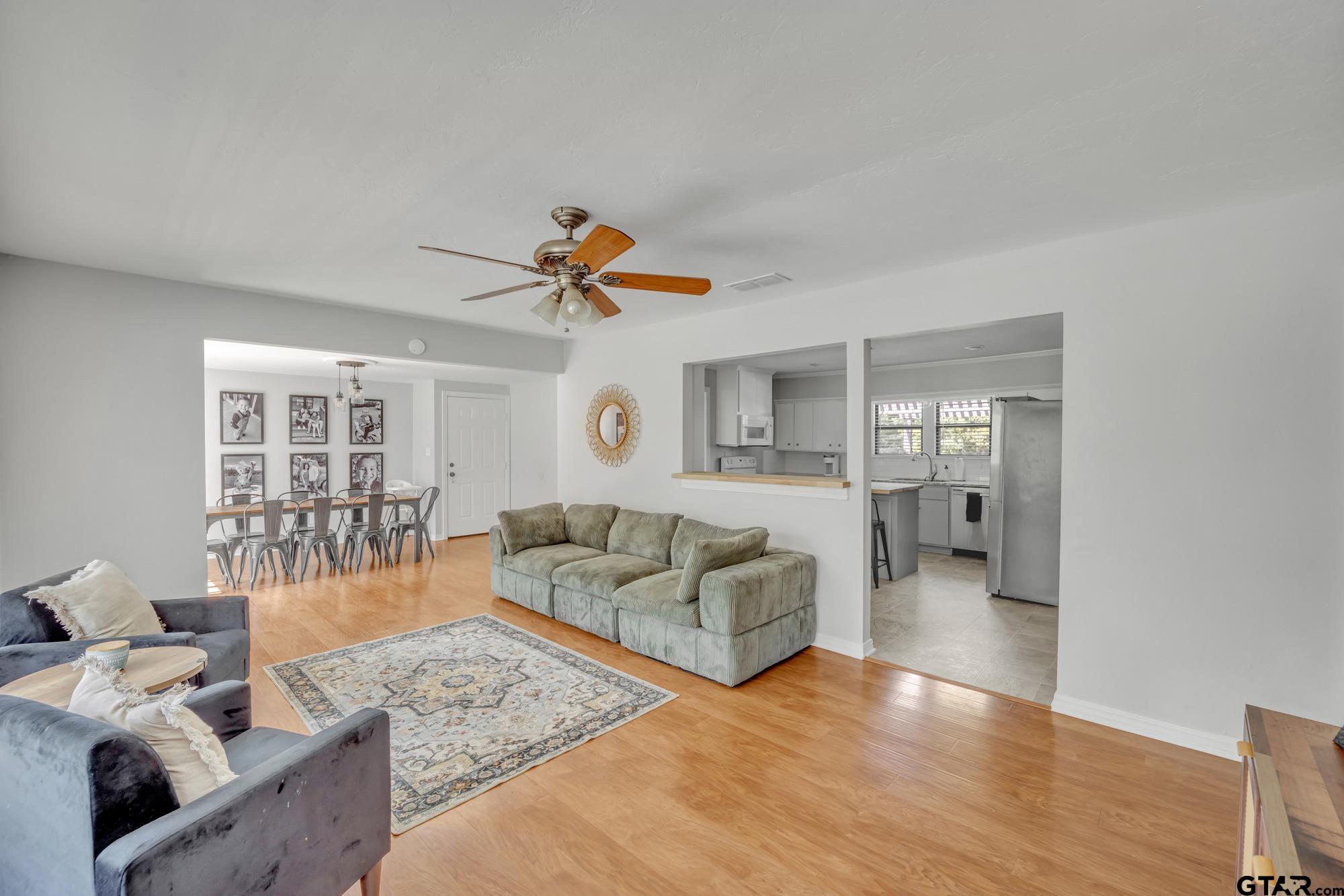 3601 Dumas Road Longview, TX 75604 - Photo 6 of 27 a living room with furniture and a large window