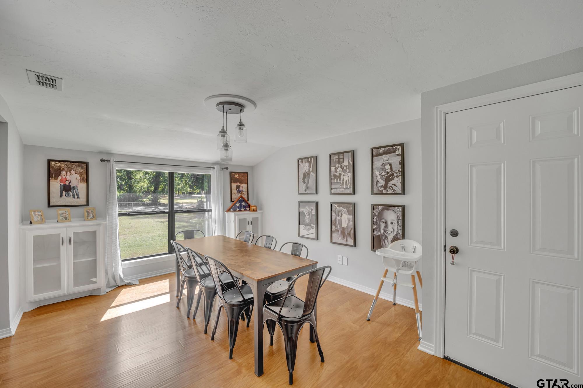 3601 Dumas Road Longview, TX 75604 - Photo 8 of 27 a view of a dining room with furniture window and wooden floor