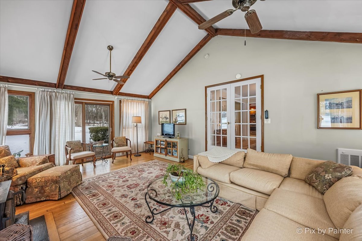 11N575 Rohrssen Road Elgin, IL 60120 - Photo 14 of 58 a living room with furniture and a large window