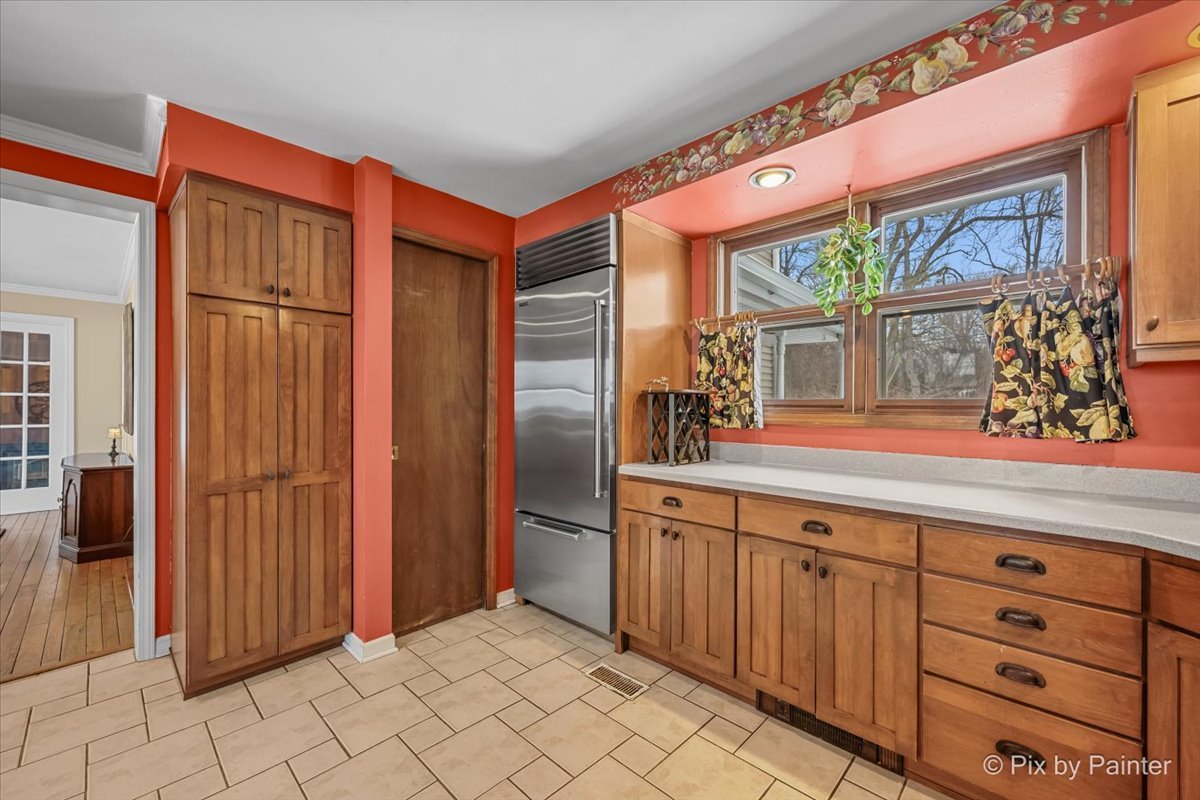 11N575 Rohrssen Road Elgin, IL 60120 - Photo 20 of 58 an empty room with wooden floor and windows