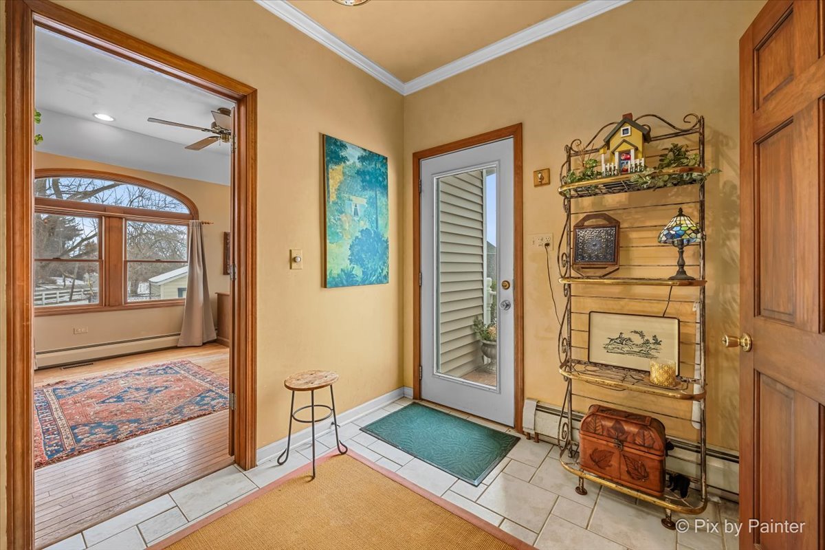 11N575 Rohrssen Road Elgin, IL 60120 - Photo 23 of 58 a view of an entryway with wooden floor