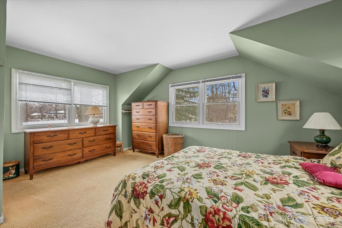 11N575 Rohrssen Road Elgin, IL 60120 - Photo 26 of 58 a bedroom with a bed and a dresser