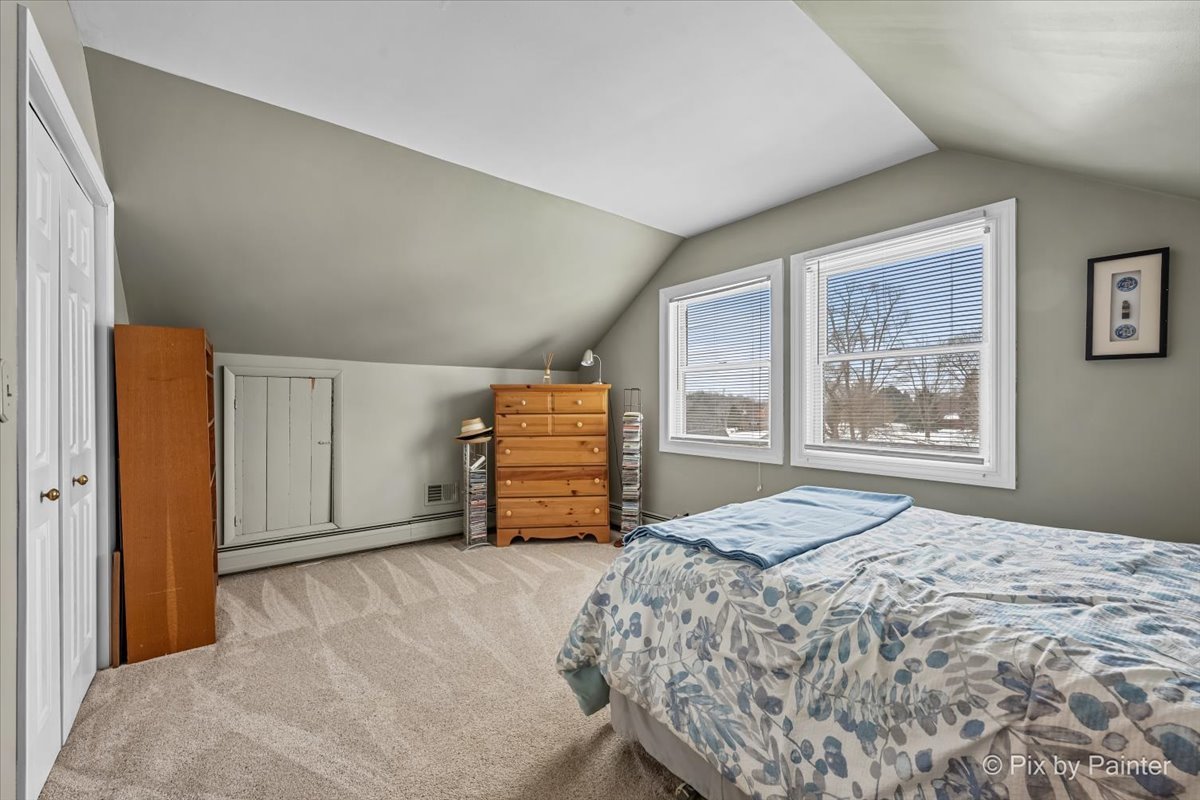 11N575 Rohrssen Road Elgin, IL 60120 - Photo 30 of 58 a bedroom with a bed and a window